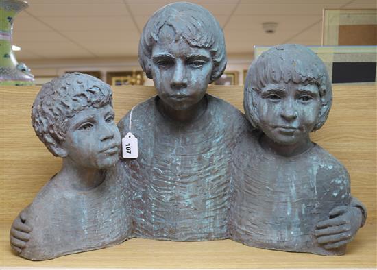 A late 20th century bronze finished fibreglass group of three children